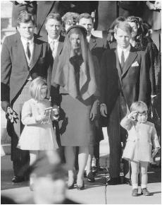 This popular image of the Kennedy family taken during John F. Kennedy's funeral shows John Jr. paying tribute to his father with a salute. AP/WIDE WORLD PHOTOS