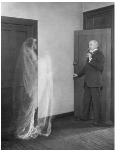 Visual ghosts, similar to this image (c. 1910), are the most common type of apparition; however, some ghosts tend to be "heard" clanking chains and making other noises rather than being seen. CORBIS